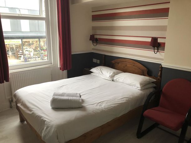 Imagen de la habitación del Hotel New George. Foto 6