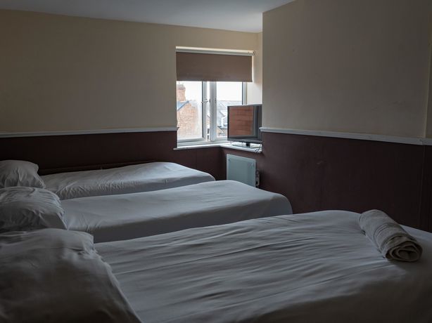 Imagen de la habitación del Hotel New George. Foto 11