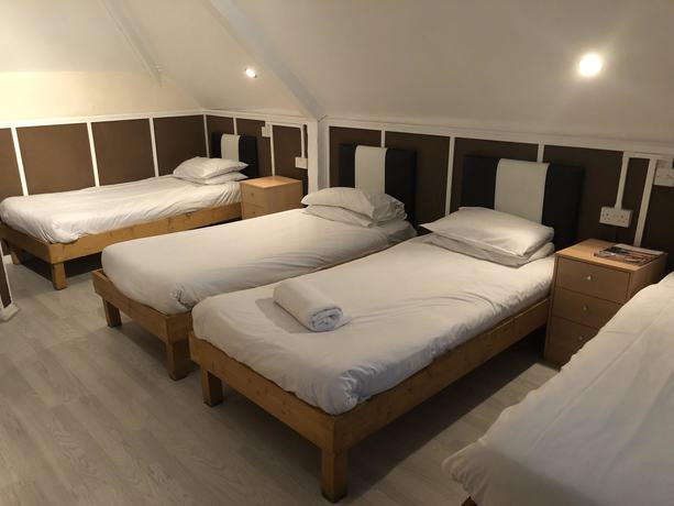 Imagen de la habitación del Hotel New George. Foto 12