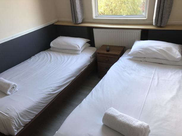 Imagen de la habitación del Hotel New George. Foto 17