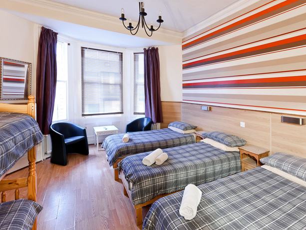 Imagen de la habitación del Hotel New George. Foto 19