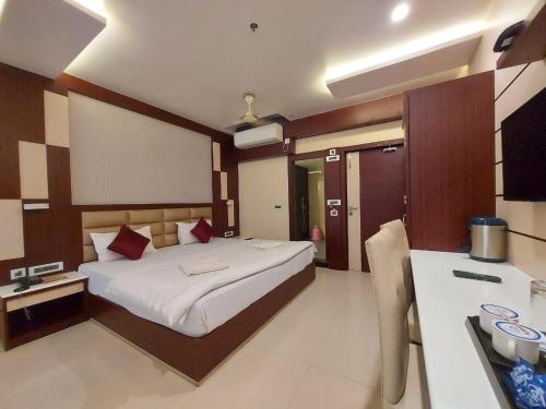 Imagen de la habitación del Hotel New Gitanjali, New Digha. Foto 16