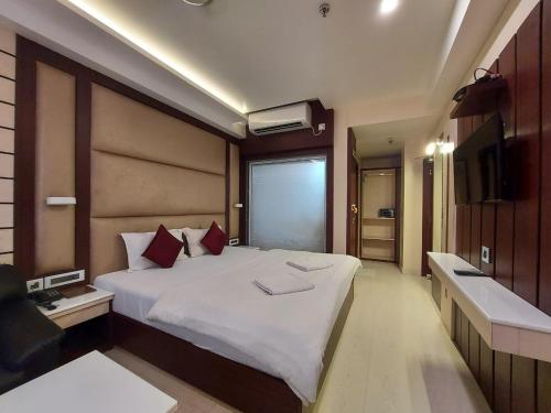 Imagen de la habitación del Hotel New Gitanjali, New Digha. Foto 17