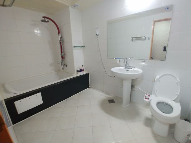 Imagen de la habitación del Hotel New Grand. Foto 13