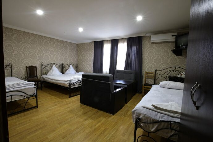 Imagen de la habitación del Hotel New Grand. Foto 15