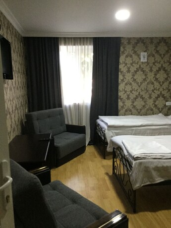 Imagen de la habitación del Hotel New Grand. Foto 16