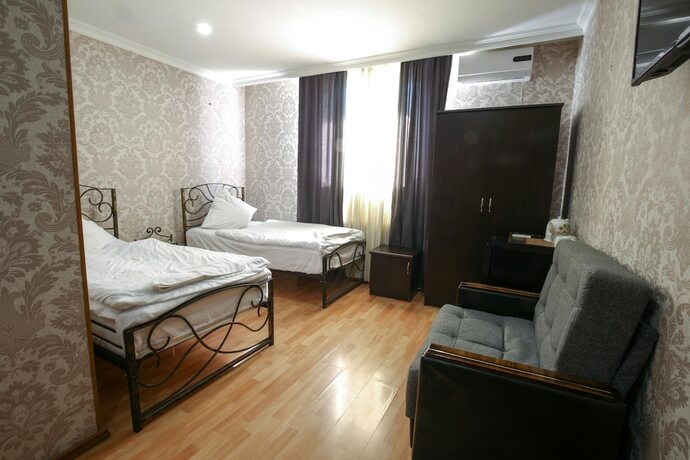 Imagen de la habitación del Hotel New Grand. Foto 17
