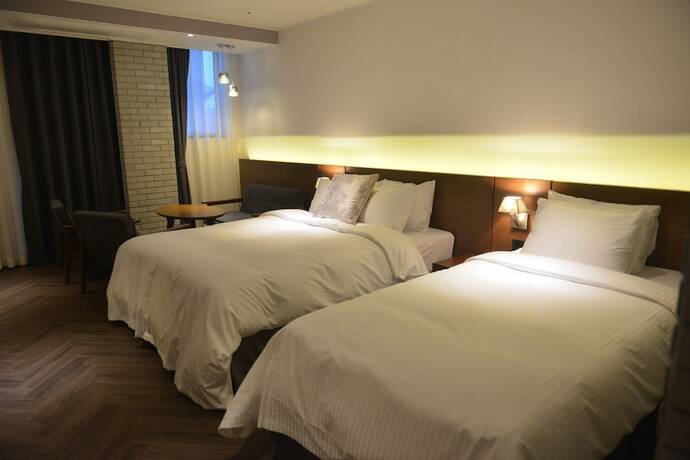 Imagen de la habitación del Hotel New Grand, Jinju. Foto 12