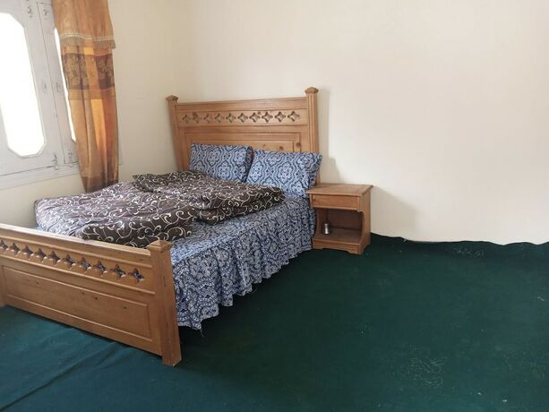 Imagen de la habitación del Hotel New Green Land. Foto 8