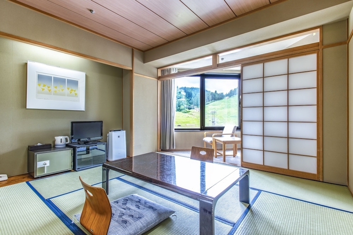 Imagen de la habitación del Hotel New Greenpia Tsunan. Foto 10