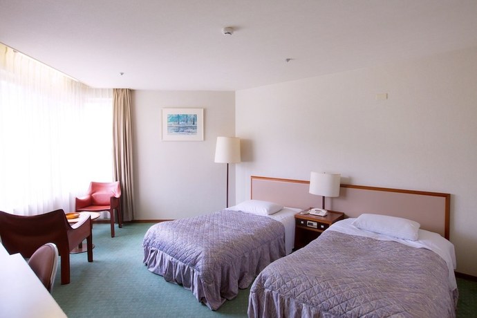 Imagen de la habitación del Hotel New Greenpia Tsunan. Foto 11