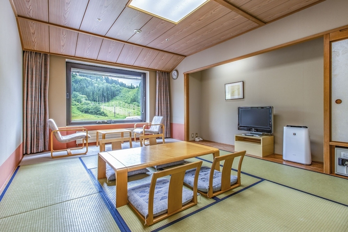 Imagen de la habitación del Hotel New Greenpia Tsunan. Foto 12