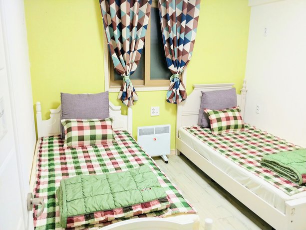 Imagen de la habitación del Hotel New Gwangju Guesthouse. Foto 5