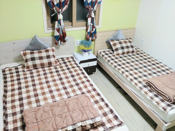 Imagen de la habitación del Hotel New Gwangju Guesthouse. Foto 12
