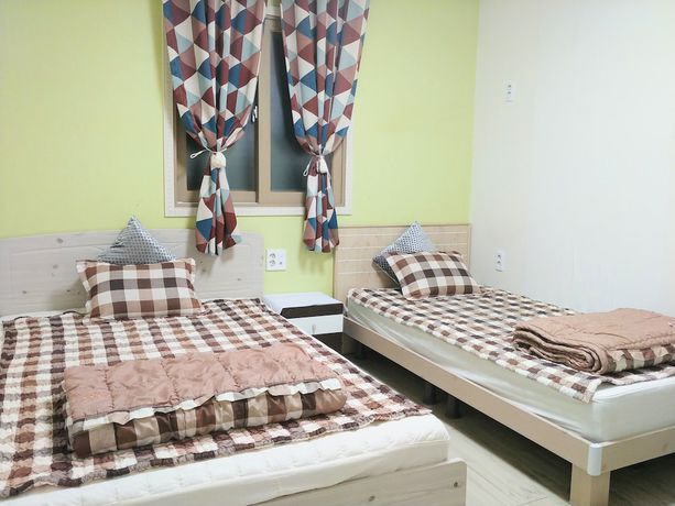 Imagen de la habitación del Hotel New Gwangju Guesthouse. Foto 13