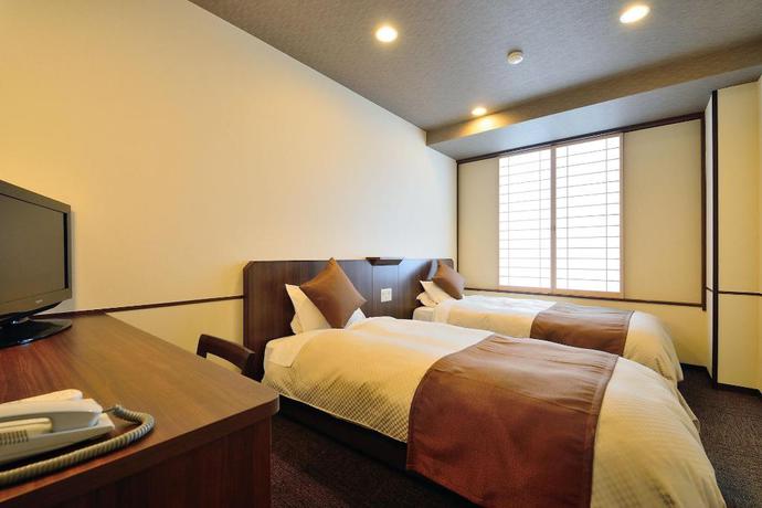 Imagen de la habitación del Hotel New Hakkeien. Foto 16