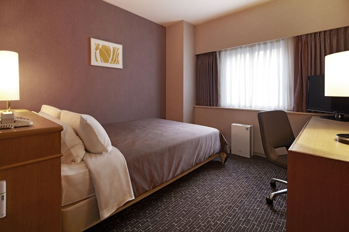 Imagen de la habitación del Hotel New Hankyu Osaka. Foto 16