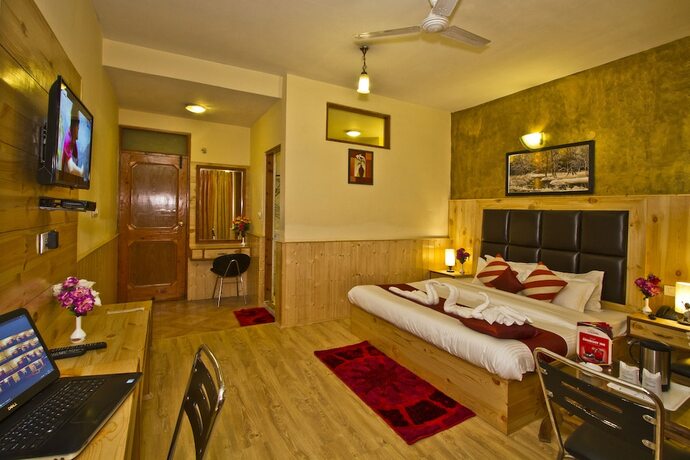 Imagen de la habitación del Hotel New Harmony Inn. Foto 9