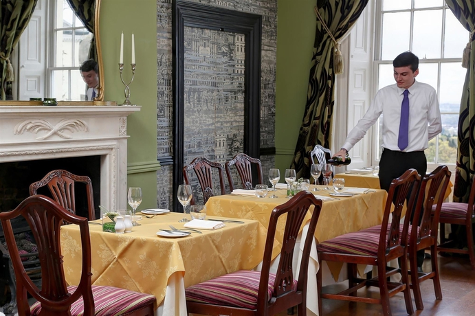 Imagen del bar/restaurante del Hotel New House Country. Foto 9