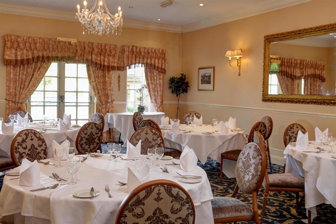 Imagen del bar/restaurante del Hotel New House Country. Foto 12