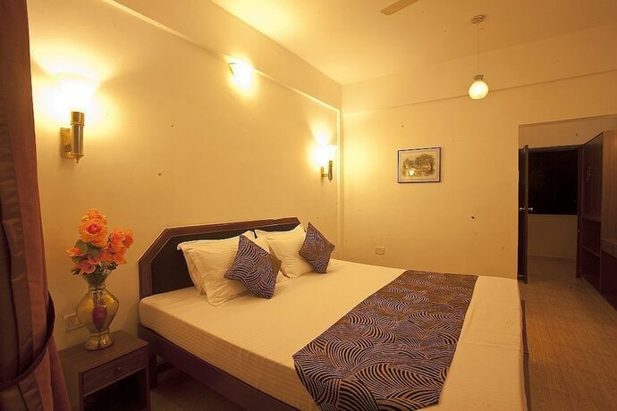 Imagen de la habitación del Hotel New Image Inn. Foto 16