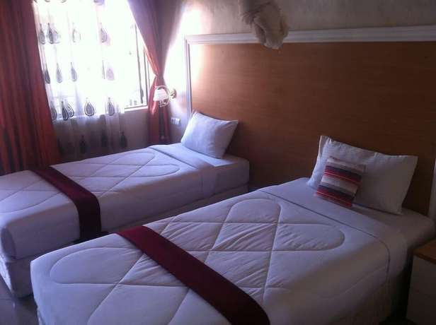 Imagen de la habitación del Hotel New Impala. Foto 2