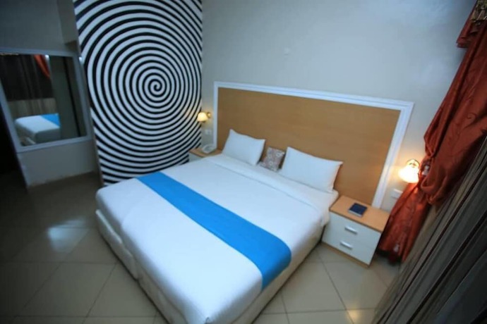 Imagen de la habitación del Hotel New Impala. Foto 4