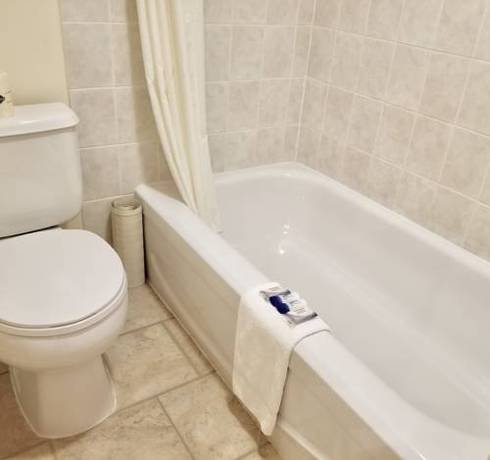 Imagen de la habitación del Hotel New Imperial Inn. Foto 4