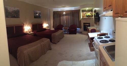 Imagen de la habitación del Hotel New Imperial Suites. Foto 3