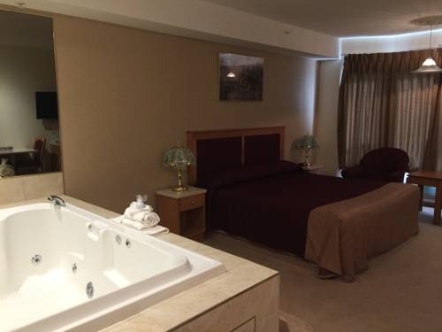 Imagen de la habitación del Hotel New Imperial Suites. Foto 4