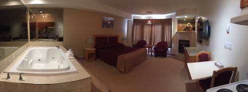 Imagen de la habitación del Hotel New Imperial Suites. Foto 6