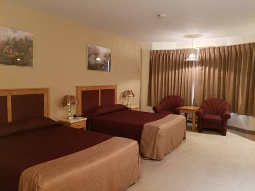 Imagen de la habitación del Hotel New Imperial Suites. Foto 9