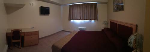 Imagen de la habitación del Hotel New Imperial Suites. Foto 13