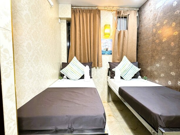 Imagen de la habitación del Hotel New International Guest House, Kowloon. Foto 9