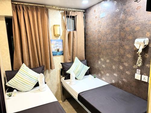 Imagen de la habitación del Hotel New International Guest House, Kowloon. Foto 8