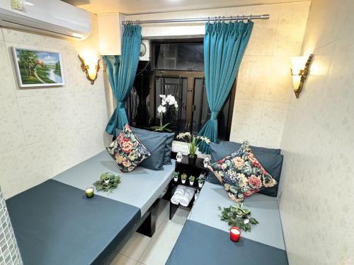 Imagen de la habitación del Hotel New International Guest House, Kowloon. Foto 9