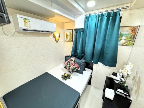 Imagen de la habitación del Hotel New International Guest House, Kowloon. Foto 14