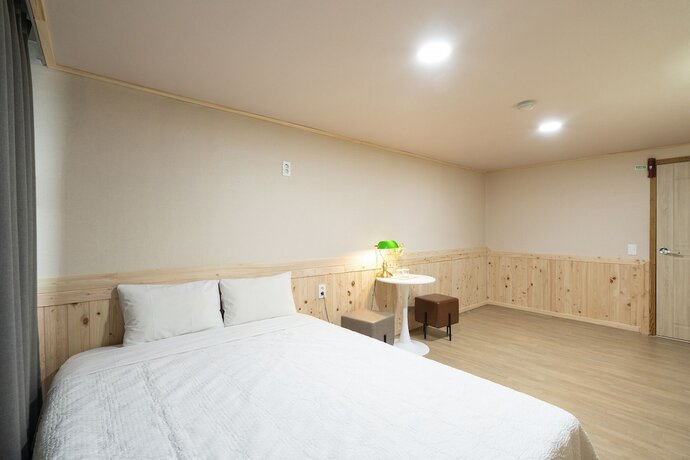 Imagen de la habitación del Hotel New Jeju. Foto 11