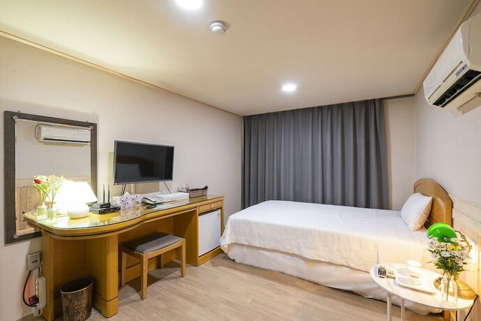 Imagen de la habitación del Hotel New Jeju. Foto 12