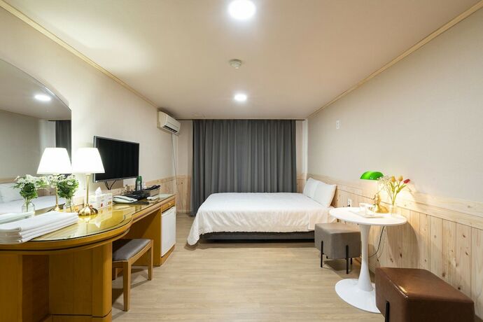 Imagen de la habitación del Hotel New Jeju. Foto 14