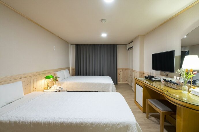 Imagen de la habitación del Hotel New Jeju. Foto 15