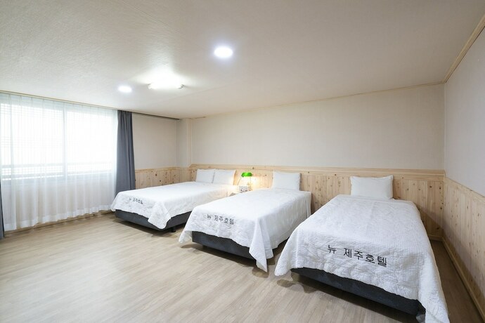 Imagen de la habitación del Hotel New Jeju. Foto 16