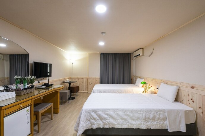 Imagen de la habitación del Hotel New Jeju. Foto 20