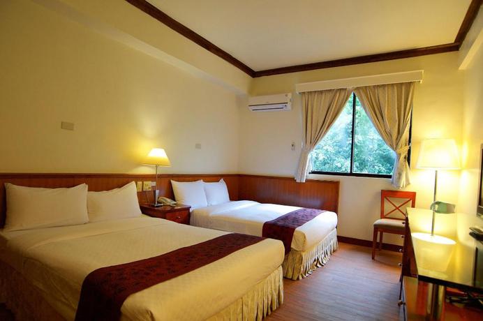 Imagen de la habitación del Hotel New Jhihben Hotel. Foto 3