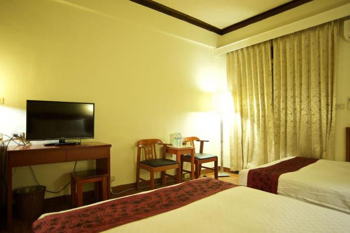 Imagen de la habitación del Hotel New Jhihben Hotel. Foto 8