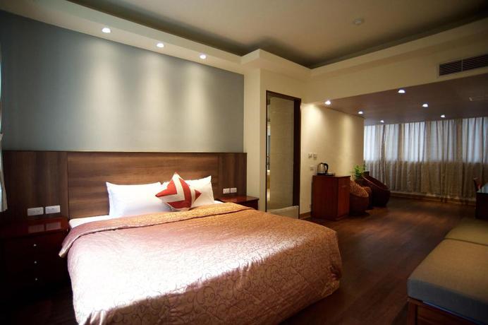 Imagen de la habitación del Hotel New Jhihben Hotel. Foto 10