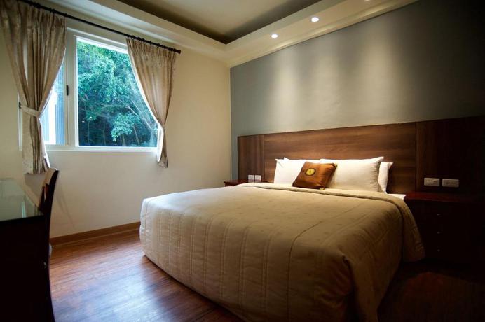 Imagen de la habitación del Hotel New Jhihben Hotel. Foto 11