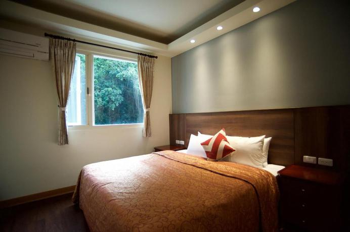 Imagen de la habitación del Hotel New Jhihben Hotel. Foto 12