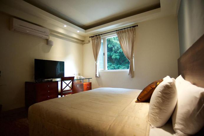 Imagen de la habitación del Hotel New Jhihben Hotel. Foto 14