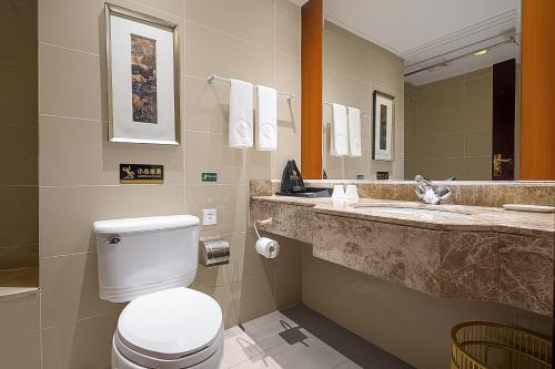 Imagen de la habitación del Hotel New Jiuzhai. Foto 18